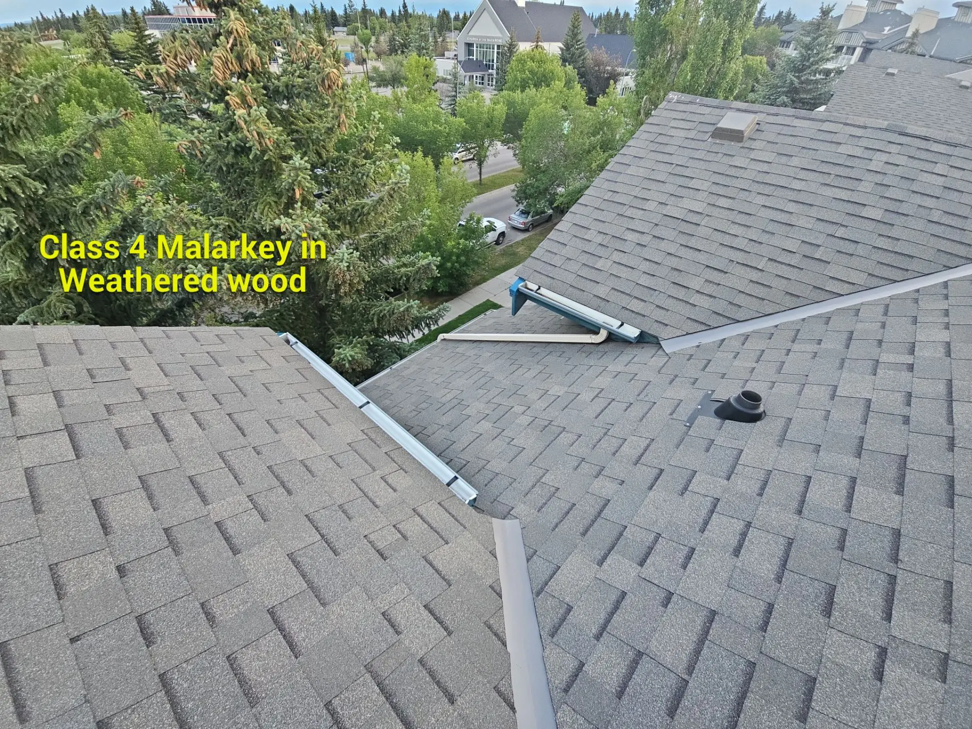 Malarkey Class 4 impact-rated weathered-wood asphalt shingles installed by CPR Group in SW Calgary