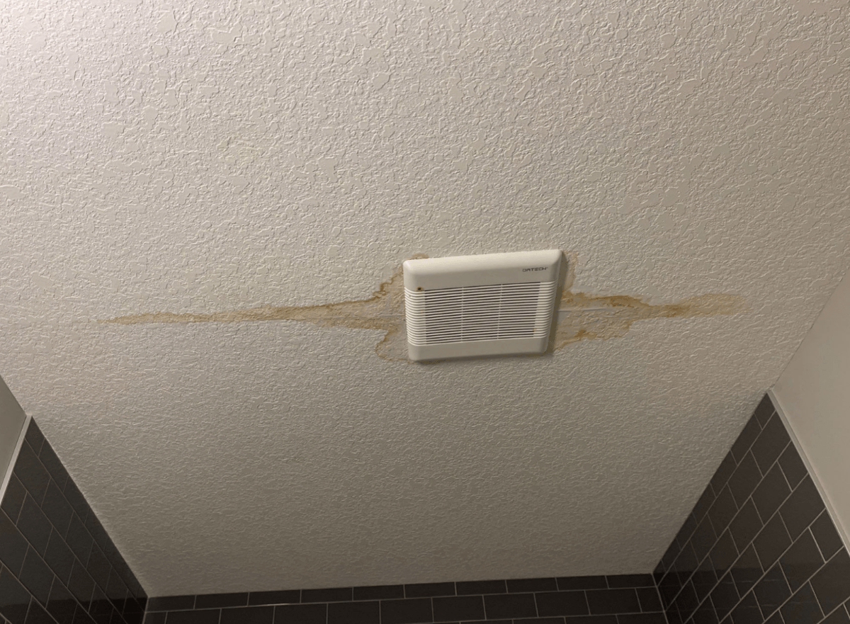 Attic rain/condensation causing drywall ceiling stain to bathroom vent