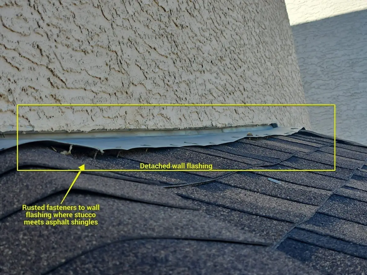Detached wall flashing over time experiencing water ingress and dampening sheathing to bump out of house
