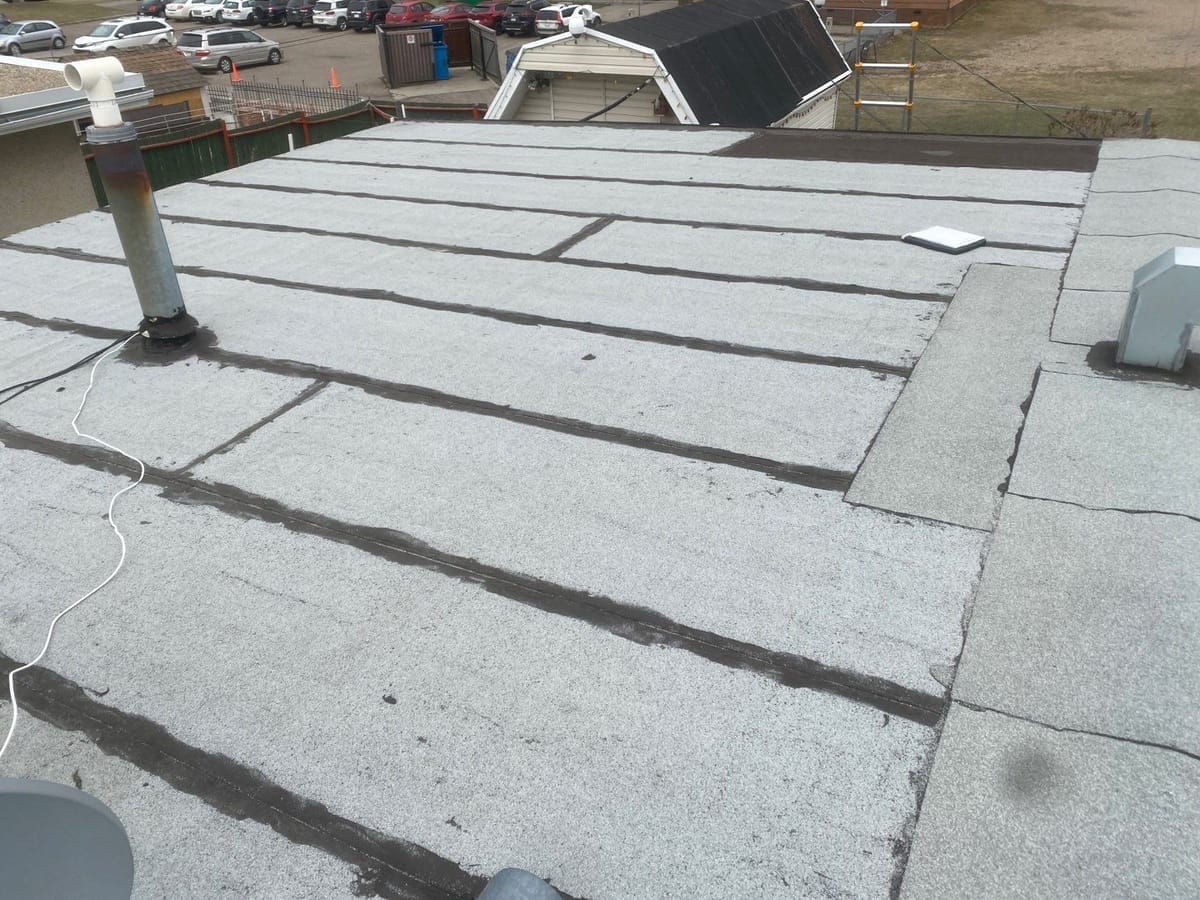 Adhesive renewal to SBS flat roof seams
