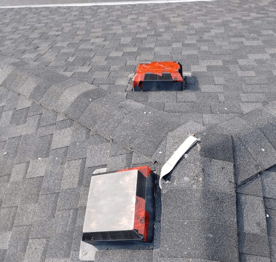 red tape on top of turtle vents to cover holes from hail damage