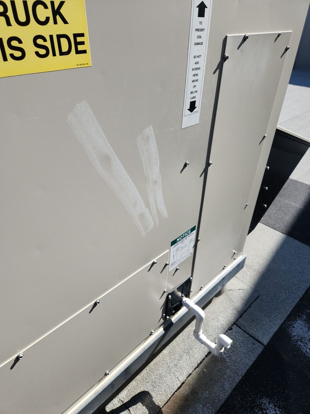 Chalk used to identify hail hits to HVAC units