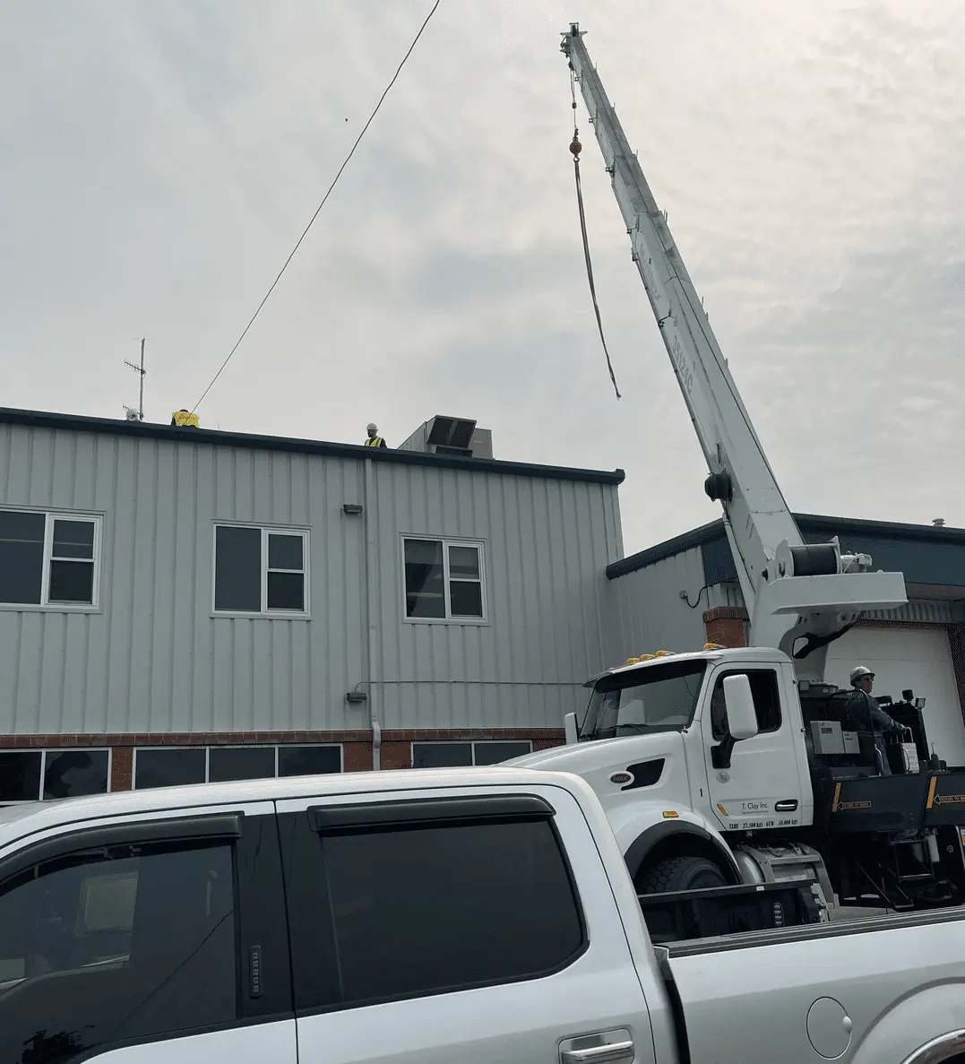 Commercial roofers from CPR Group Ltd working on a Chestermere fire hall roof