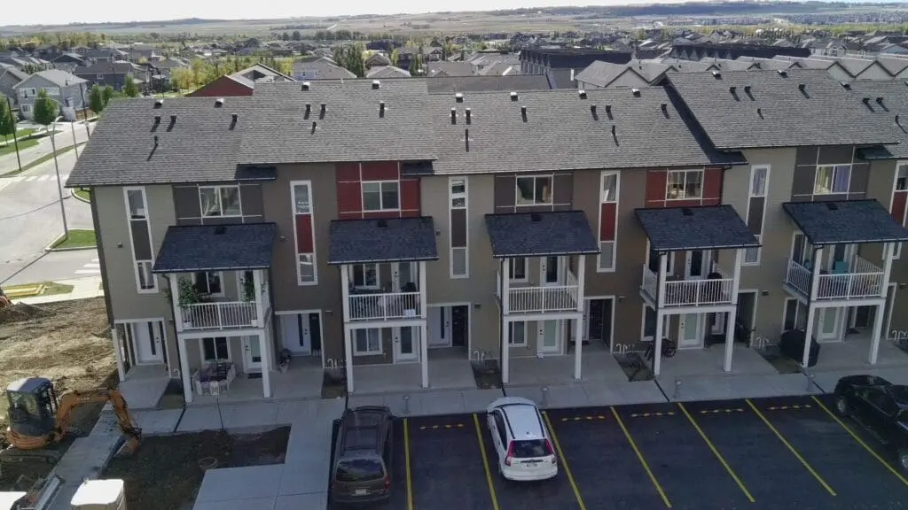 Condo building exterior renovations, 1 Ranchers Blvd Okotoks AB