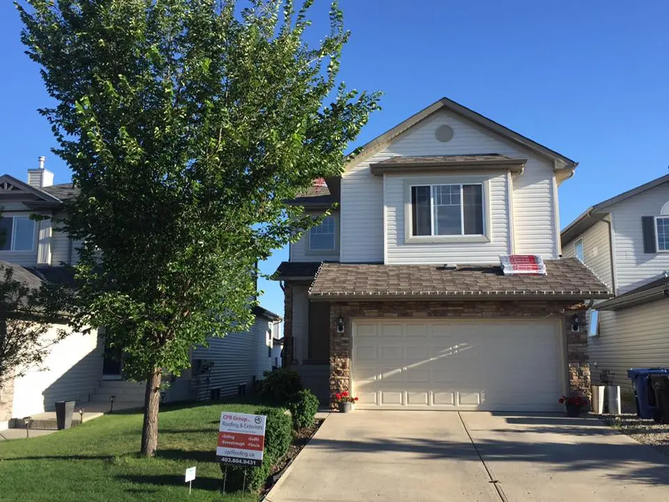 Work in progress on a new roof in Calgary by CPR Group Ltd
