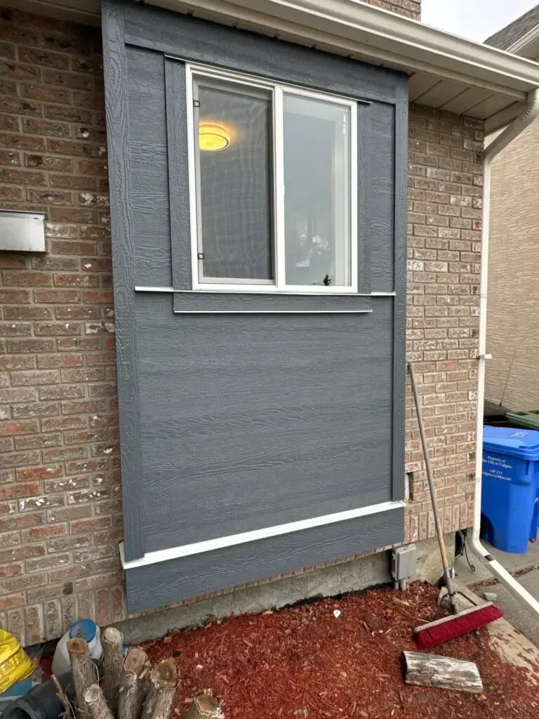 Board and batten fiber cement siding on a Calgary home by CPR Group Ltd
