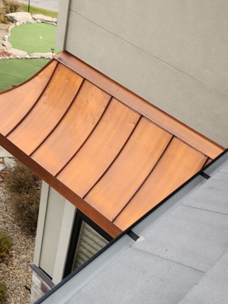 Hail dents to metal copper roof