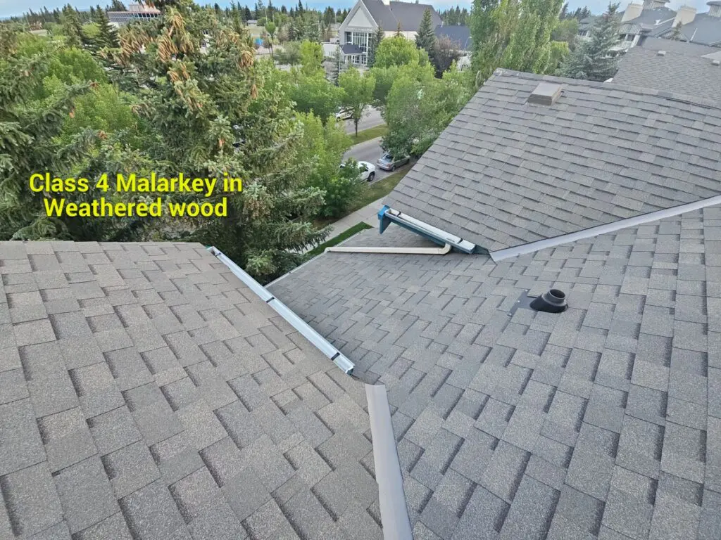 malarkey-class-4-shingle-weathered-wood-installed-30-richard-place-sw-calgary-laurel-house malarkey class four shingle impact resistant in weathered wood colour installed in Calgary