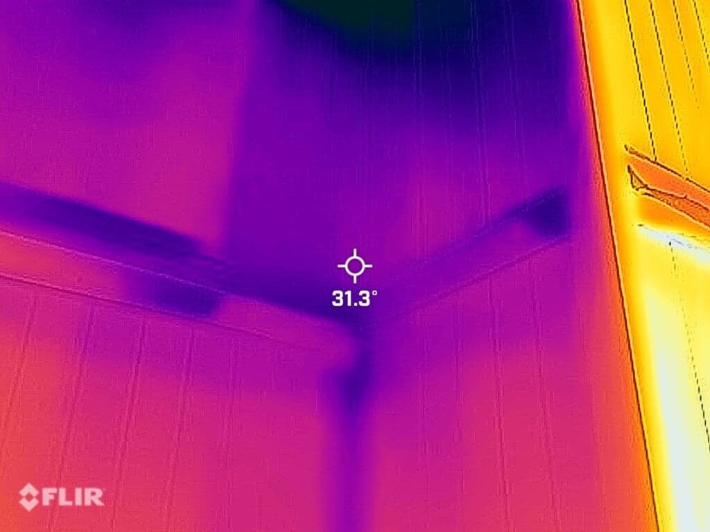flir-thermal-imaging-showing-cold-spots-thermal-bridging flir thermal imaging noting thermal bridging to exterior wall - view from inside corner house